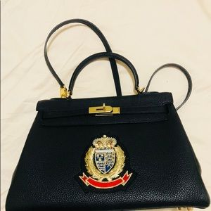 Parodie Officiale Kelly Bag